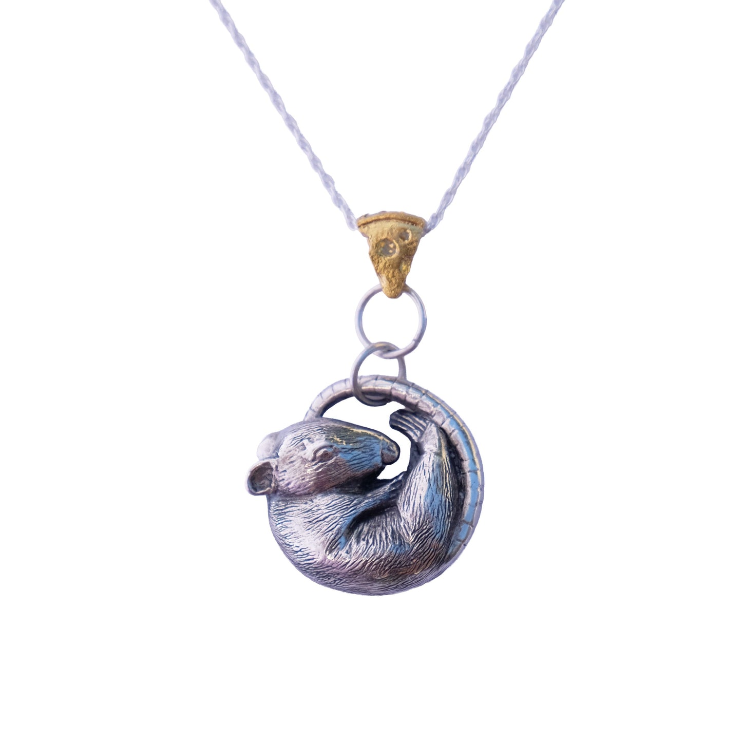 Silver rat pendant on a white background