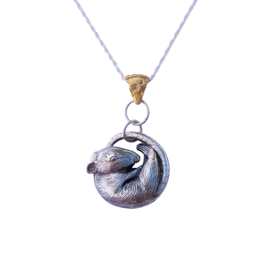 Silver rat pendant on a white background